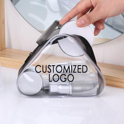 China Low MOQ Transparent Custom Small Triangle Fashion PVC Toiletry Bag Makeup Bag Travel Wash Cosmetic Bag for sale