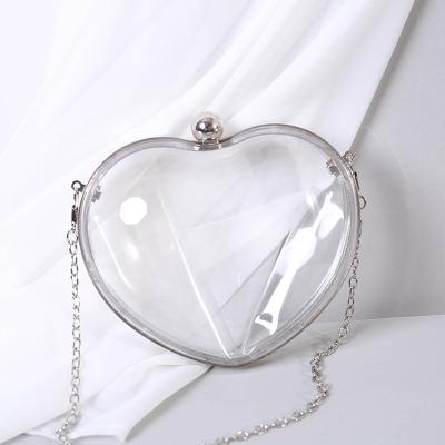 China Fashion New Fashion Women's Acrylic Mini Transparent Love Bag Clutch Dinner Bag Heart Shaped Evening Clutch Bag for sale