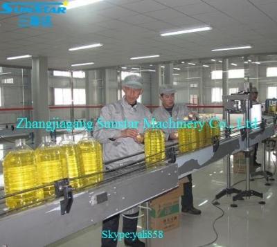 China Chemical automatic linear type frying oil bottling machine for corn almond peanut essential oil into barrel or bottle jar can for sale