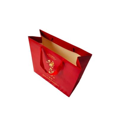 China Chinese Professional Manufacturer Printed Personalized Blue Shiny Laminated Retail Shopping Paper Bag Recyclable With Logos for sale