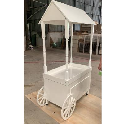 China Durable / Beautiful Amina Craft Wedding White Wooden Silk Candy Display Carts With Wheels For Outdoor Wedding Decoration for sale