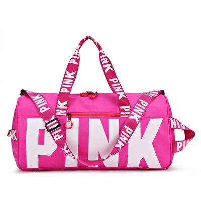 China Wholesale Waterproof Water Resistant Weekend Sport Gym Bag Women Pink Spend Overnight Duffel Bag for sale