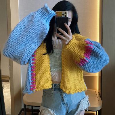 China Anti-Wrinkle New 2021 Winter Thick Open Stitch Lantern Sleeve Lantern Coat Hand Knitted Short Cardigan Sweater for sale