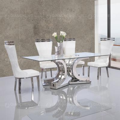 China Glass 12 seater dining table sets stainless steel glass top modern luxury Italian high gloss metal furniture design large dining table for sale