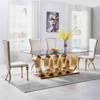 China Durable Modern 8 Seater Dinner Set Stainless Steel Dining Table for sale