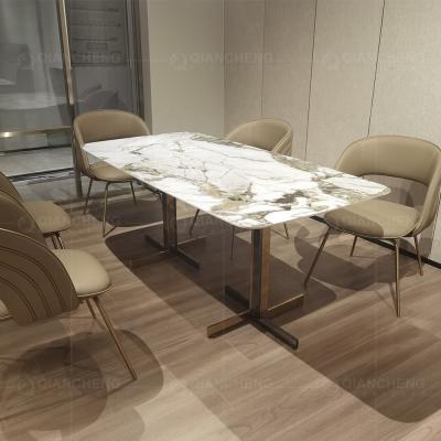 China Marble Agglomerated Stone Table Top With Matte Gold Stainless Steel Frame Dining Table for sale