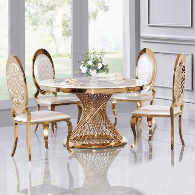 China Gold stainless steel marble top luxury morden round marble dining table for sale