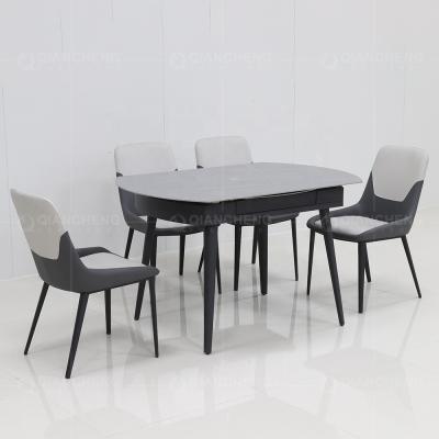 China Round Iron Stone Top Modern Base Hotel Clumped Expandable Dining Table for 6 for sale