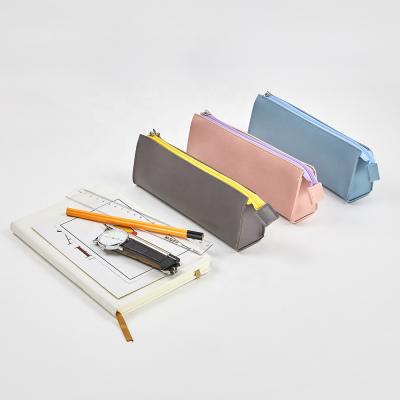 China Waterproof Makeup Cosmetic Pouch Bag Zipper Triangle Pencil Bag PU Stationery Storage Bag for sale