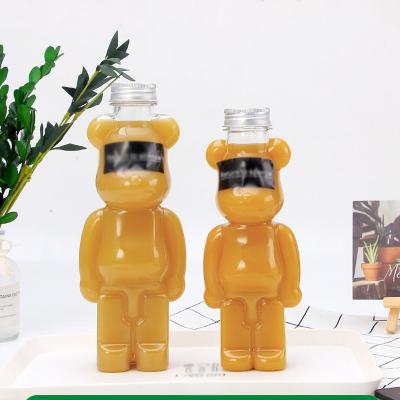 China Creative Recyclable Pet Bear Drink Bottle 500ml Kids Material Violent Bear Honey Bottle for sale