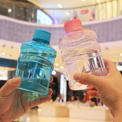 China 1000ml Mini Mineral Water Bucket Recyclable Material Lemonade Bucket With Lid Packing Bucket Pet Bottle Plastic Bottle for sale