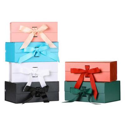 China Recyclable Custom Logo Pink Ribbon Folding Luxury Rigid Packaging Large Magnetic Hamper Gift Box for sale