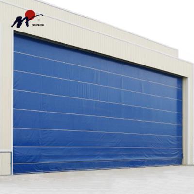 China Large Industrial Auto PVC Fabric Flexible Top Folding Rolling Door Hangar For Aircraft Hangar for sale