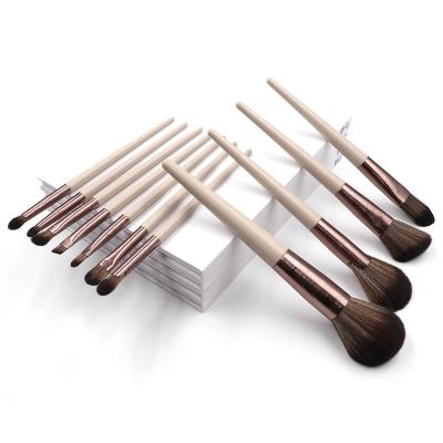 China Angular Blush Synthetic Hair Makeup Brush 11 Pcs Private Label Wooden Handle for sale