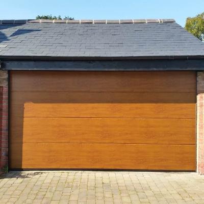 China Modern | sectional garage door in imitation wood for sale