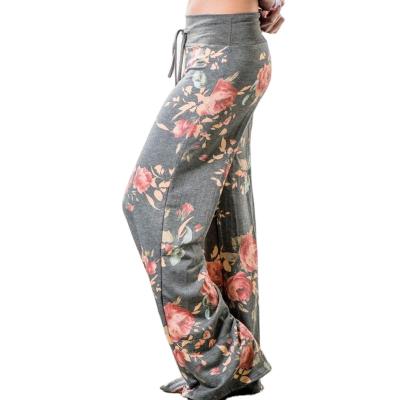 China new Anti-wrinkle 2021 autumn plus long wide leg pants Bohemia women floral print pants and waist women's pants with pockets women trousers for sale