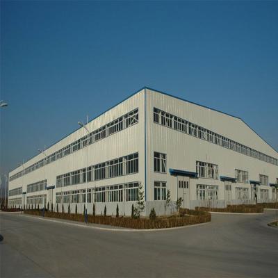 中国 Painted Hot Dip Galvanized Steel Frame Workshop With Versatile Sandwich Panel Door 販売のため