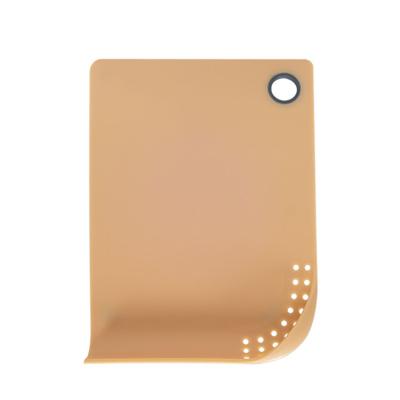 China New Design Sustainable Kitchen PP Hole Sustainable And Hanging Multi Function Cutting Board With Strainer for sale