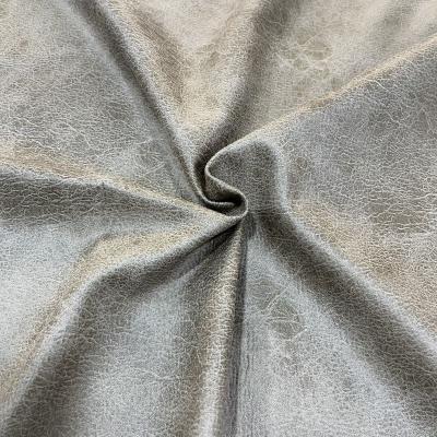 China Breathable 100 Polyester Faux Leather Fabric Printing Embossed Bronzed Suede Upholstery Sofa Fabric for sale