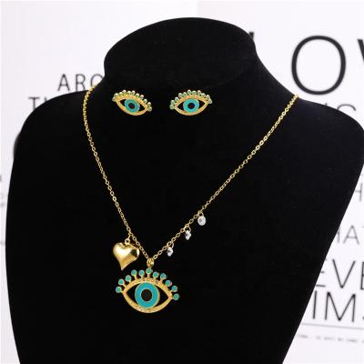 China Fantastic Women's Turkish Blue Eye Fatima 18K Gold Plated Color Crystal Jewelry Stainless Steel Necklace Ear Stud Jewelry Fashion Set for sale