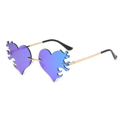 China Funny Party Sunglasses Women Anti Love UV400 2022 Heart Sunglasses Rimless Metal Heart Colorful Trendy Sun Glasses for sale