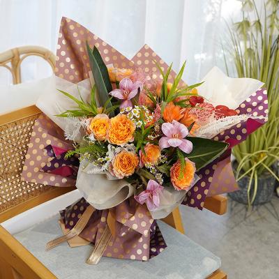 China Hot Selling Amazon Paper Wrap Paper Wrap Gift Wraps Custom Hot Korean Waterproof Plastic Colorful Flower Bunch Bouquet Wrapping Paper for sale