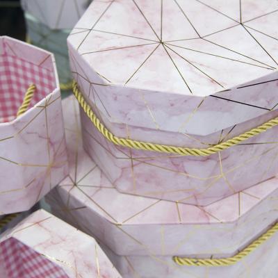 China Recyclable Customized Octagon Shaped Box With PP Rope Handles for sale