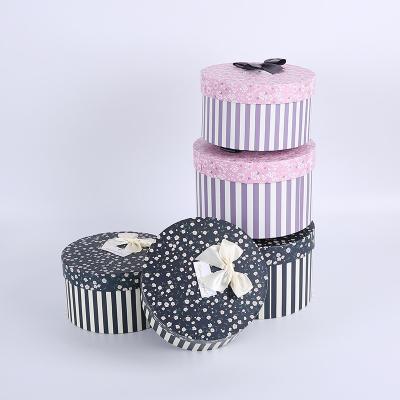 China Recyclable Luxury Floral Printing Packaging Box Round Birthday Gift Paper Box With Ribbon Tier for sale