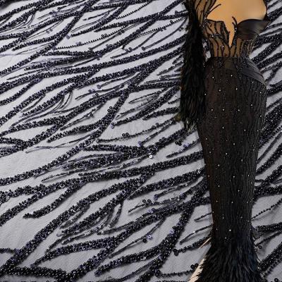 China Elastic African Shiny French Sequins Fabrics Net Lace Tulle Embroidered Beads Embroidered Fabric For Wedding/Evening Dress for sale