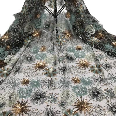 China Elastic Firework Sequin Lace In Korea Multi Size Sequin Mix Color Tulle Lace Embroidery Net Lace Fabric for sale