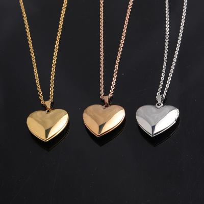 China TRENDY Custom Laser Lettering Luminous Photo Pendant Heart Shape Stainless Steel Finish Pendant Necklace For Woman en venta