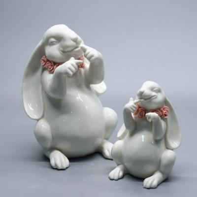 China Europe Ceramic Craft Porcelain Naughty Fine White Rabbits With Handmade Flowers for sale