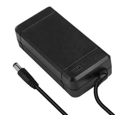 China Input 100-240v 50-60hz DOE ERP VI AC 63W DC Adapter 18v ​​3.5a Power Adapter 120*53*30mm for sale