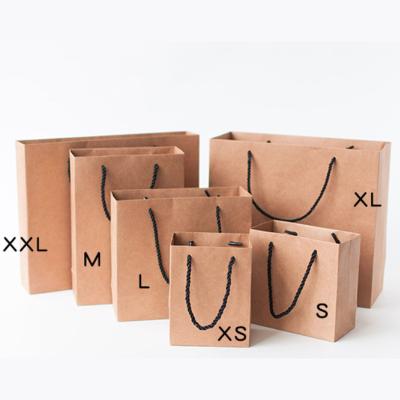 China Recyclable Retro Cutaway Gift Box One Brown Portable Paper Bag Clothing Christmas Gift Gift Bag Packaging for sale