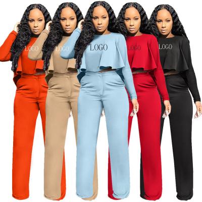 China QUICK DRY clothes bluey fall and new winter solid color hollow out two piece set long sleeve design high waist wide leg pants for sale