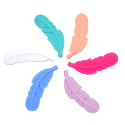 China Hot Selling 100%Food Grade Silicone Teether New Baby Shape Latest Custom Funny Silicone Teether Toy For Kids Feature Feather Shape for sale