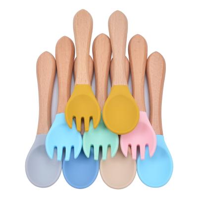 China 100% BPA Free Eco-Friendly Cute Wooden Handle Baby Bowl Silicone Spoon and Fork Matching Feeding Sets for sale