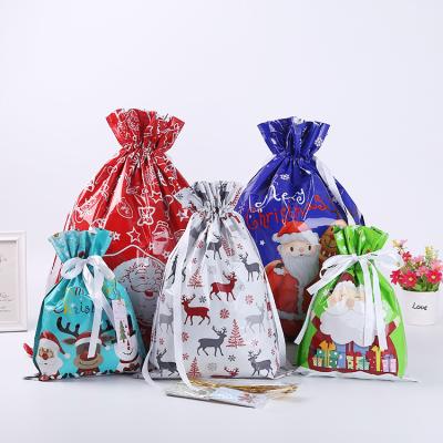 China Small MOQ Aluminum Cord Merry Christmas Santa Candy Party Gift Big Plastic Twine Bags Large Capacity Storage for sale