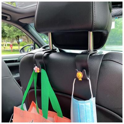 China Universal Car Seat Vehicle Hooks Multifunctional Cute Cartoon Car Rear Seat Headrest Storage Hooks for sale