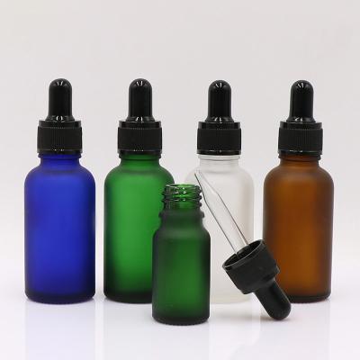 China Cosmetic 10ml 30ml Frosted Black Cosmetic Cuticle Essential Oil Containers Cylinder Dropper Bottle for sale