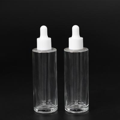 China Cosmetic Custom Design Matte Clear Empty Perfume 100ml Glass Bottle For Essential Oil for sale