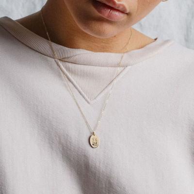 China Environmental Friendly 14K Gold Plated Stainless Steel Rock Gesture Two Oblong Hand Pendant Necklace Hot Popular Pendant For Girls for sale