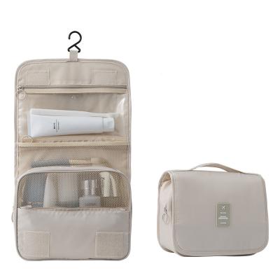 China Waterproof Portable Bathroom Travel Women Makeup Bag High Capacity Toiletries Organizer Storage Cosmetic Cases Wash Beauty Hanging Bags for sale