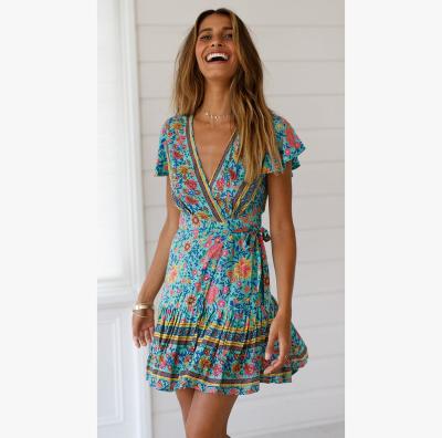 China Women's Summer Anti-Static Wrap V Neck Floral Print Bohemian Ruffle Swing A Line Beach Mini Dress for sale