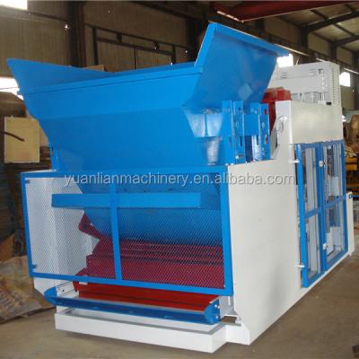 China Automatic Cement Egg Laying Block Machine Half Concrete Block Making Machine Used Paver Block Machine for sale