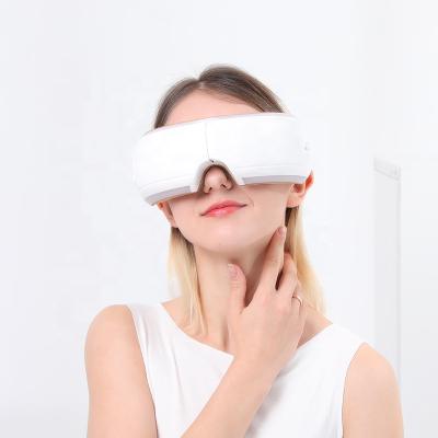 China Hezheng Heating Head Vibration Eye Massager with Music for sale