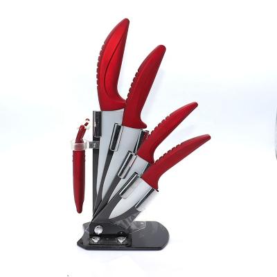 China Viable Ceramic Knives With Peeler With Brave Man TPR Handle In Color White Blade for sale