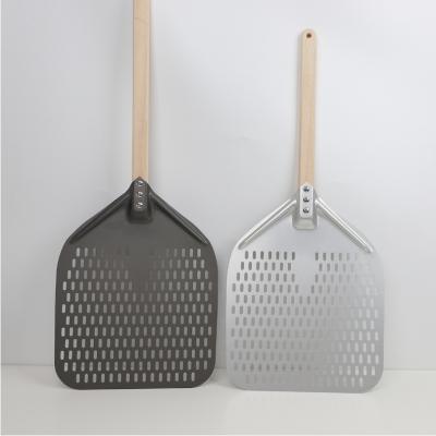 China 14 Inch Thickened Pizza Peel Handle Slotting Punch Wood Type Oven Shovel for sale