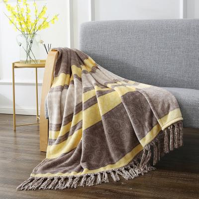 China 2022 Winter Popular Printed Promotional Folded Tassel Flannel Sofa Blanket Fleece Throw Blankets For Kids for sale