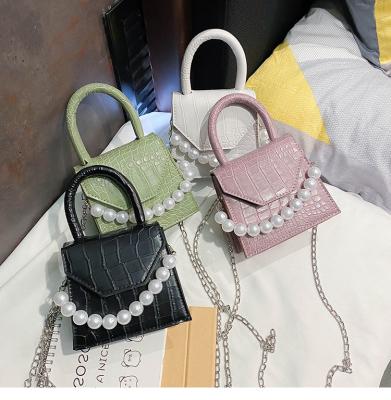 China 2021 fashion fashion handbags PU purses and mini handbags pearl handbags for sale